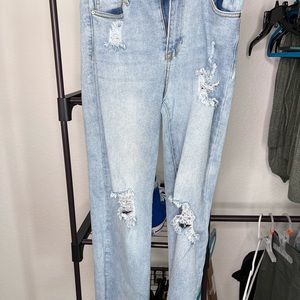 Ripped light blue jeans